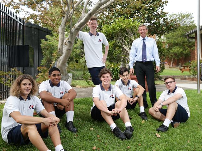 Balgowlah Boys has performed well in NAPLAN and the HSC since they introduced a focus on literacy and numeracy some years ago. Principal Paul Sheather with a group of students.