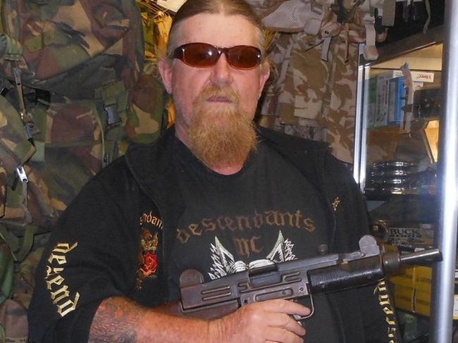 Gun-toting bikie gets a Christmas gift from the courts