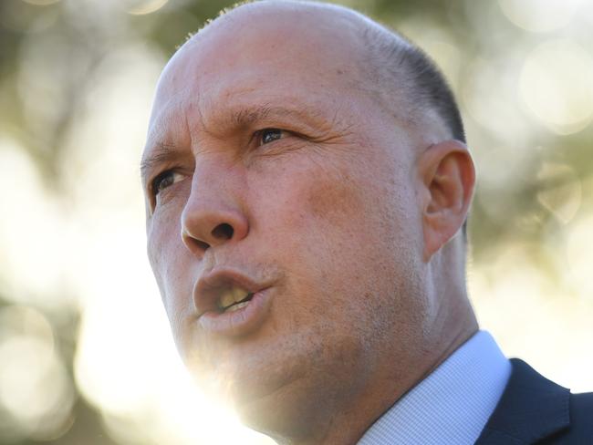 Minister for Home Affairs Peter Dutton says he had no prior knowledge of raids on media offices. Picture: AAP