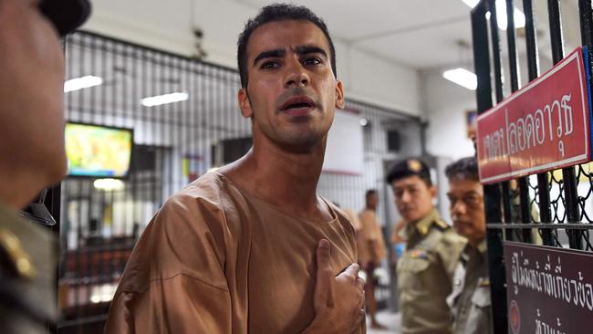 Hakeem al-Araibi, a Bahraini refugee and Australian resident, is escorted to a courtroom in Bangkok. Photo: Lillian Suwanrumpha/ AFP.