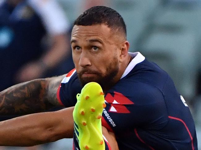 Rebels Quade Cooper kicks during the Round 1 Super Rugby match between the Brumbies and the Melbourne Rebels at GIO Stadium in Canberra, Friday, February 15, 2019. (AAP Image/Mick Tsikas) NO ARCHIVING, EDITORIAL USE ONLY