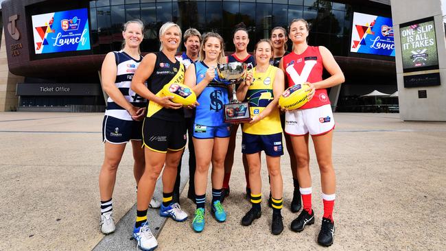 SANFLW captains (left to right) Lauren Buchanan (South Adelaide), Cass Hartley (Glenelg), Natalie Seaman (Central District assistant coach), Georgia Bevan (Sturt), Leah Cutting (Norwood), Adele Gibson (Woodville-West Torrens), Lauren Rodato (West Adelaide) and Nadia von Bertouch (North Adelaide) at the season launch. <br/>Picture: AAP/Mark Brake