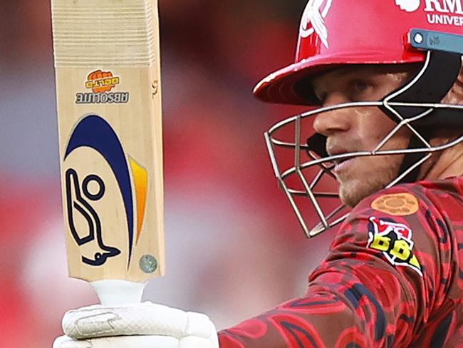 MELBOURNE, AUSTRALIA - JANUARY 18: Jake Fraser-McGurk of the Renegades raises his bat after scoring a half century during the BBL match between Melbourne Renegades and Brisbane Heat at Marvel Stadium, on January 18, 2025, in Melbourne, Australia. (Photo by Mike Owen/Getty Images)