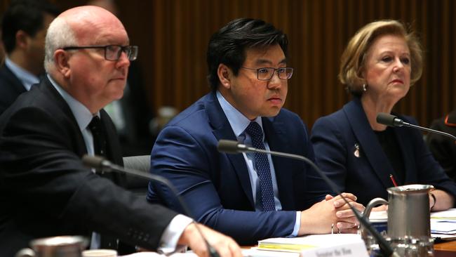 Attorney-General George Brandis, Race Discrimination Commissioner Tim Soutphommasane and Gillian Triggs, President of the Australian Human Rights Commission, appear at a Senate committee. Pic: Kym Smith