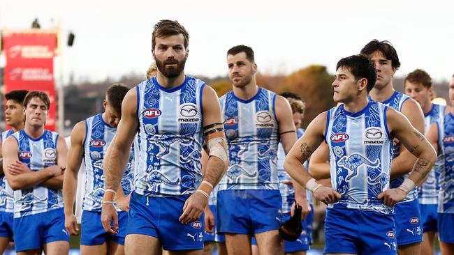 HOBART, AUSTRALIA - MAY 25: The Kangaroos look dejected after a loss during the 2024 AFL Round 11 match between the North Melbourne Kangaroos and Yartapuulti (Port Adelaide) at Blundstone Arena on May 25, 2024 in Hobart, Australia. (Photo by Michael Willson/AFL Photos via Getty Images)