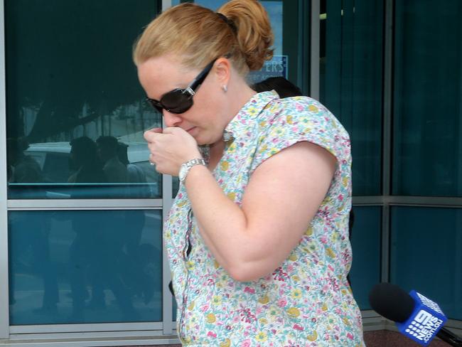 Goodstart Early Learning employee Dionne Batrice Grills, 34, (centre) from Manunda leaves the Cairns watch house with her lawyer and a supporter after being granted bail. Ms Grills has been charged with manslaughter over the death of a three-year-old boy who was found in a hot van at Edmonton last week. PICTURE: STEWART McLEAN