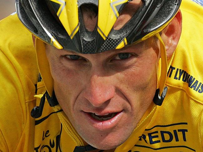 US Lance Armstrong rides during the 21st stage of the 92nd Tour de France cycling race between Corbeil-Essonnes and the Champs-Elysees in Paris, 24 July 2005. US Lance Armstrong secured his seventh Tour de France yellow jersey following the 21st and final stage of this year's race held over 144km between Corbeil-Essone and here Sunday.The 33-year-old Discovery Channel team rider finished the race with a 4min 40sec lead on Italian Ivan Basso with Germany's Jan Ullrich, the 1997 winner, finishing third on the podium at 6:21 behind Armstrong. AFP PHOTO JAVIER SORIANO