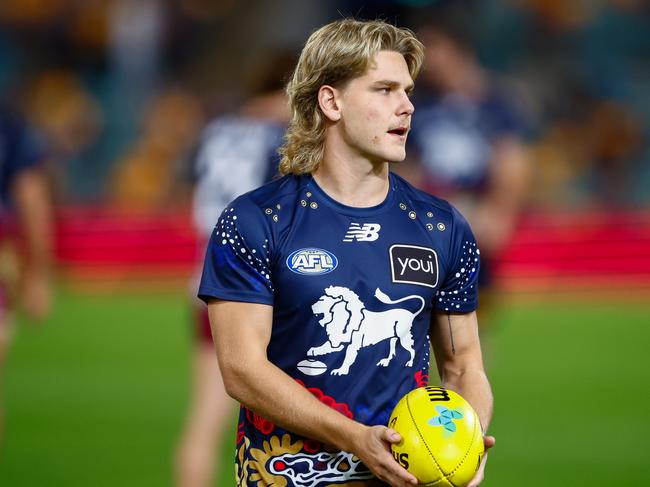 BRISBANE, AUSTRALIA - MAY 04: Will Ashcroft of the Lions warms up prior to the 2025 AFL Round 08 match between the Brisbane Lions and the Gold Coast Suns at The Gabba on May 4, 2025 in Brisbane, Australia. (Photo by Russell Freeman/AFL Photos via Getty Images)
