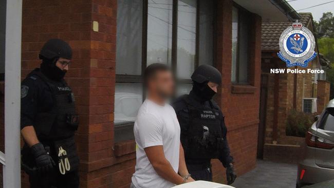 Strike Force Raptor officers arresting Beach. Picture: NSW Police