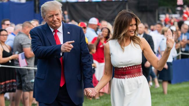 Donald and Melania Trump welcome guests to the South Lawn of the White House for July 4 celebrations. Picture: AFP