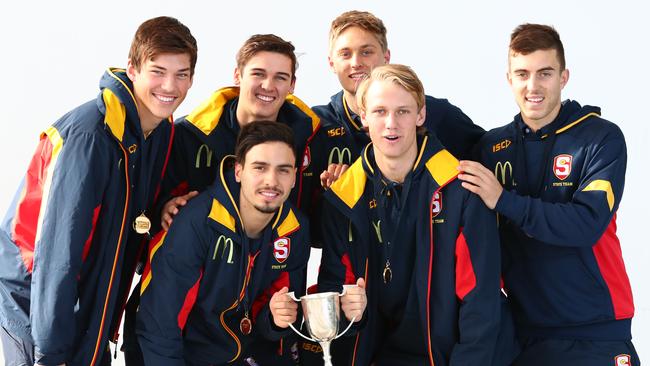 Victorious South Australian under-18s. Izak Rankine and Jack Lukosius with the national trophy at front, and, left from back, Hugo Munn, Connor Rozee, Jackson Hately and Luke Valente. Picture: Tait Schmaal