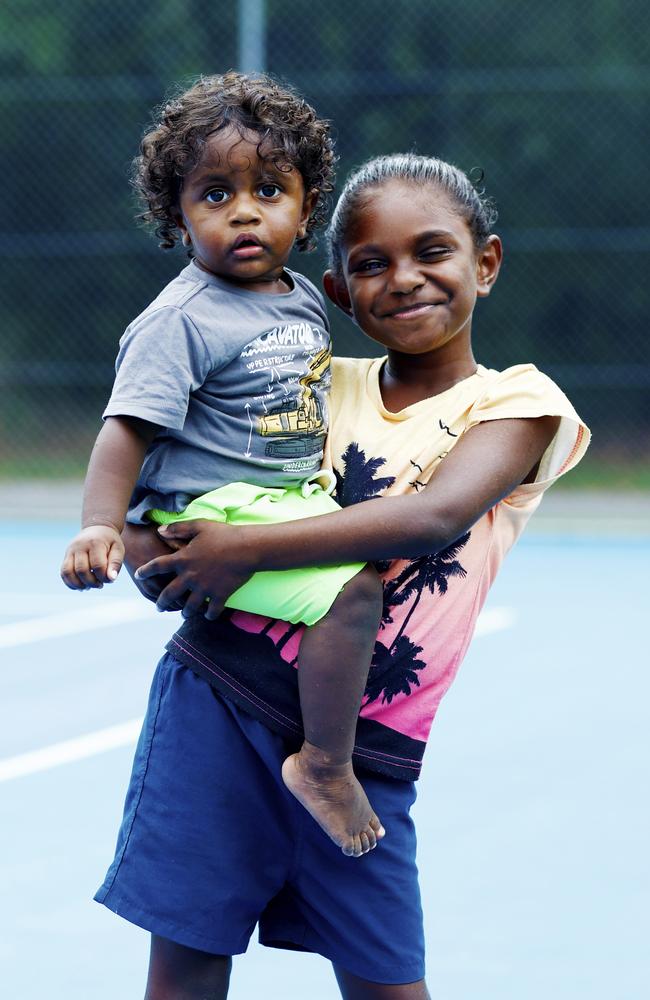 Wujal Wujal children Azalea Yougie, 7, and her cousin Kealan Nunn, 1, visit Holloways Beach hub, which provides flood victims with donated meals and essentials. Picture: Brendan Radke