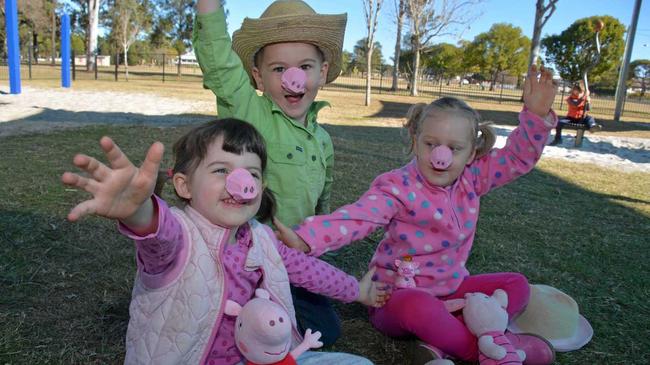 OINK: Eloise Mungall, Josh Lamping and Matilda Phillips get ready for Baconfest's Little Piggies in the Park. Picture: Jessica McGrath