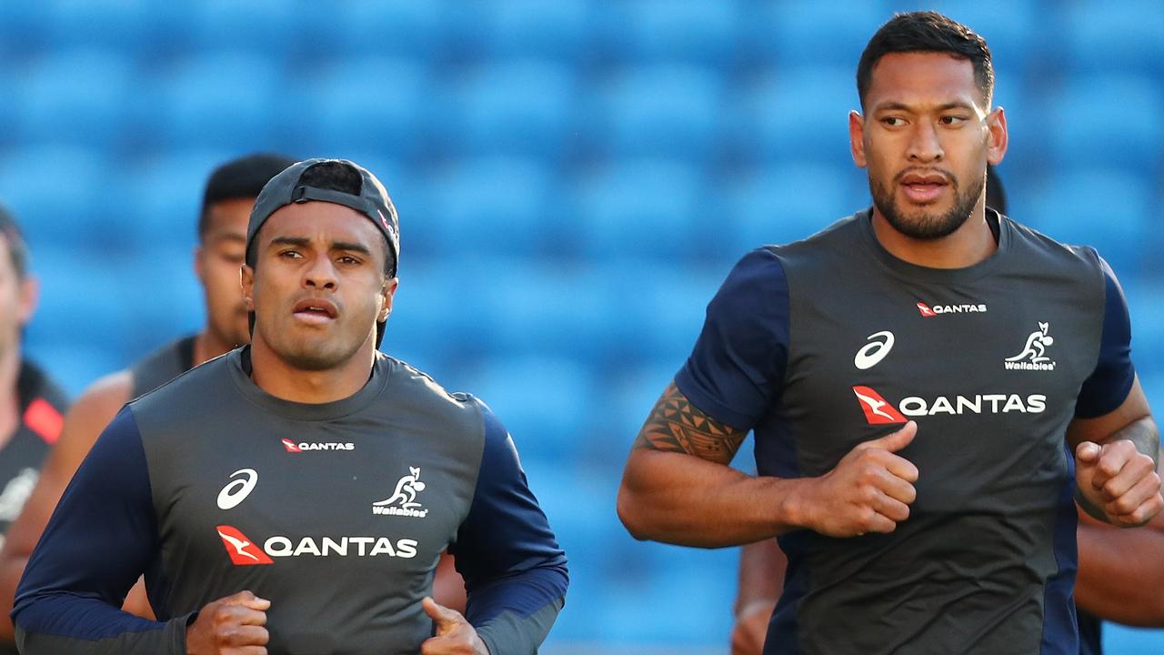 Will Genia and Israel Folau run during a Wallabies training session.