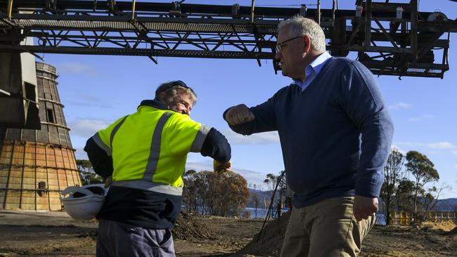 Prime Minister Scott Morrison greets a worker during a visit to the Allied Natural Wood Enterprises woodchip mill near Eden last year. Picture: Lukas Coch