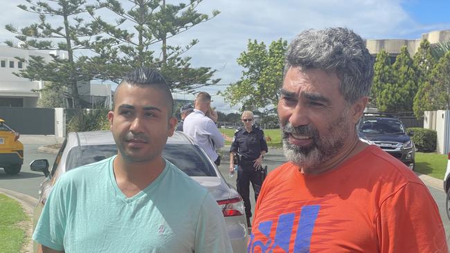 Scene of a home invasion at North Bank Court, Helensvale during which a Maserati was stolen and a Porsche damaged. Helensvale mechanic Seyed Akbar Hosseini (right – orange shirt) speaks about a terrifying home invasion where a Maserati was stolen. Picture: Lea Emery