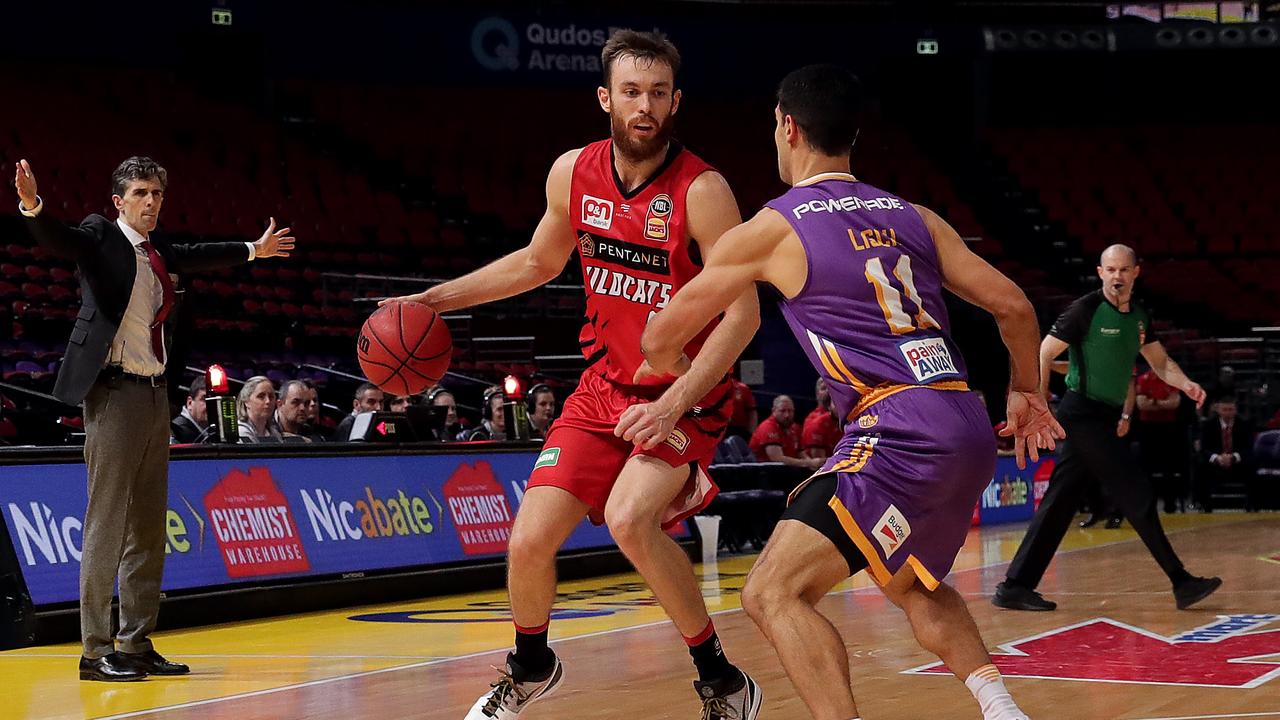 Peth Wildcats’ Nick Kay takes on Sydney Kings guard Kevin Lisch. Picture: Will Russell/Getty Images