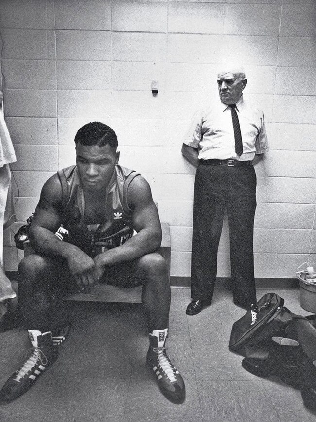 Mike Tyson with trainer Cus D'Amato before his first professional fight.