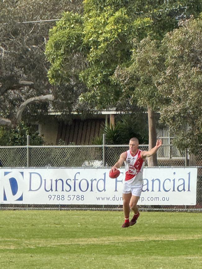 Adam Tomlinson takes a kick for Sorrento. Picture: Simon McEvoy