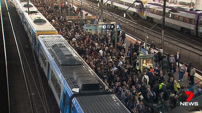 Commuters cram on to a platform at Southern Cross railway station. Picture: Channel 7/Twitter