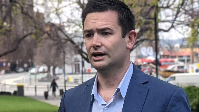 Labor MP Dean Winter speaks to the media on parliament lawns in Hobart on Monday, September 13, 2021.