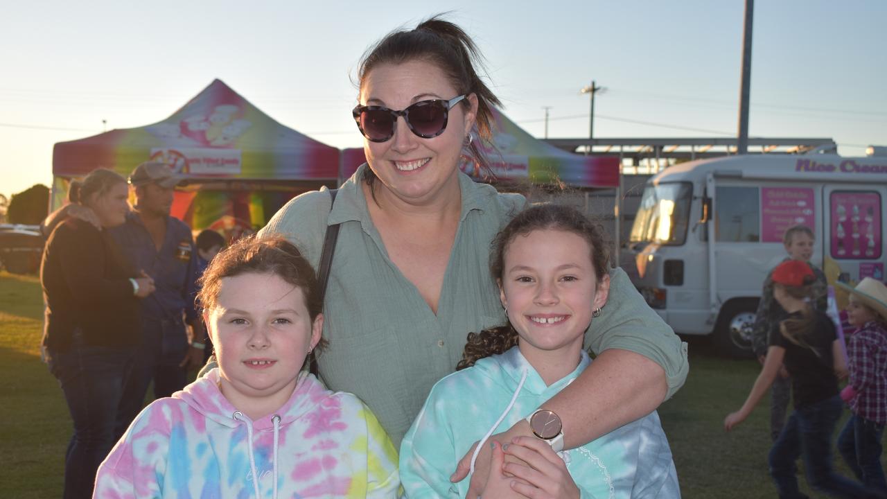 Carrie Bradfield with Bella (8) and Abbey (10) from the Gold Coast at the 2021 Killarney Rodeo. Photo: Madison Mifsud-Ure / Warwick Daily News