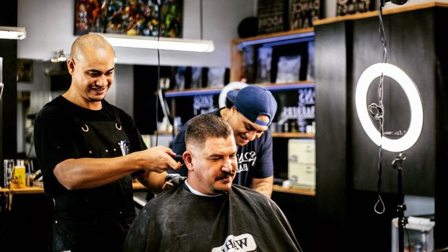 Sons of Barbers owner Joseph Tau and barber Tyrone Ketu. Picture: Supplied