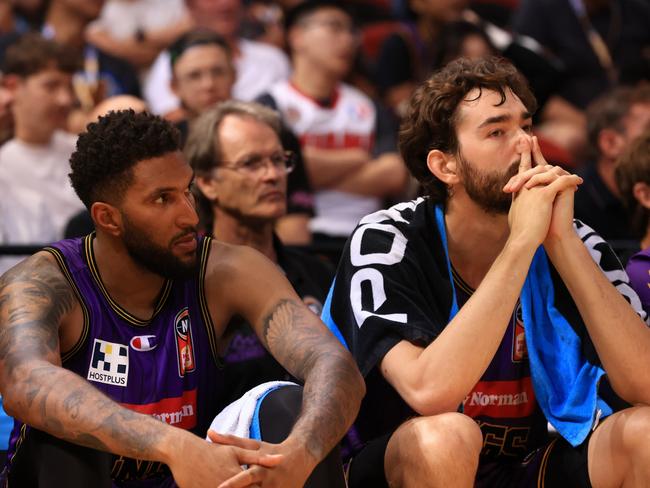 Jonah Bolden and Jordan Hunter of the Kings look on from the bench during the round 14 NBL match between Sydney Kings and Melbourne United at Qudos Bank Arena. Photo: Jenny Evans/Getty Images.