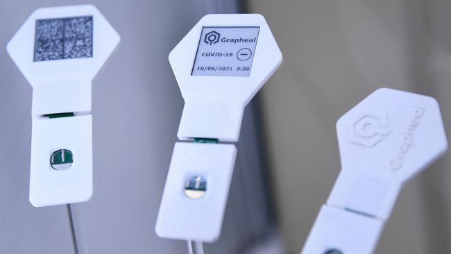 The Grapheal TestNpass digital biosensor test strip, made with Graphene for Covid-19 antigen testing featuring an encrypted RFID tag for a biometric health pass. Picture: AFP