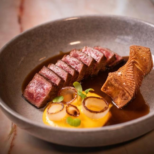 Wagyu MS 9, crispy potato, smoked carrot cream, onion soup jus at Greenglass.