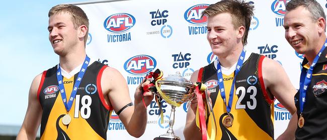 Co-captains Mitchell Riordan and Campbell Hustwaite with Stingrays coach Craig Black.