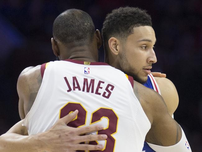 Ben Simmons embracing mentor LeBron James. Picture: Getty Images