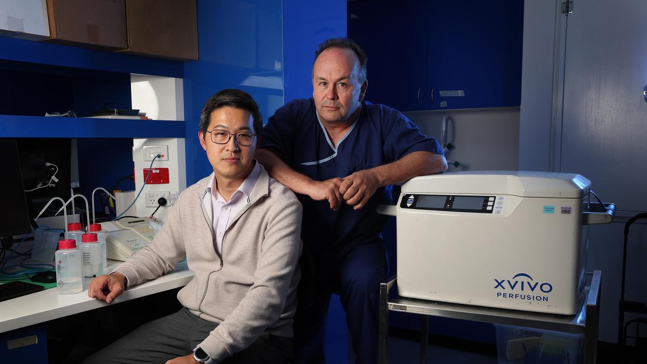 Dr Jacky Suen star lab lead and Professor John Fraser Director CCRG with the new Hypothermic oxygenated perfusion (HOPE) keeping donor hearts viable, Prince Charles Hospital, Chermside. Picture: Liam Kidston