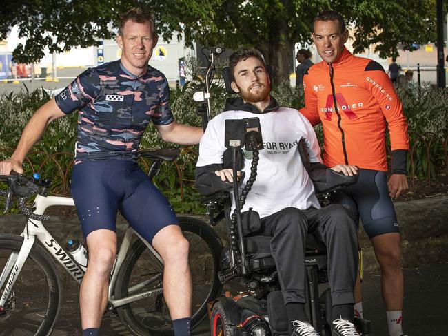 Jack Riewoldt and Richie Porte with Ryan Wiggins after the fundraising ride across Tasmania. Picture: Chris Kidd