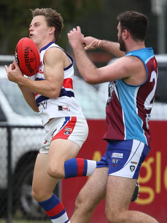 Football BFL: Modewarre v Queenscliff. Queenscliff 36 Riley Martin takes a leap for the ball over Modewarre 23 Zack May Picture: Mark Wilson