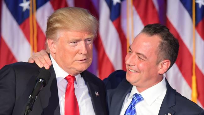 Then Chairman of the Republican National Committee (RNC) Reince Priebus (R) embracing then President-elect Donald Trump (L) during election night at the New York Hilton Midtown in New York, November 13, 2016. Picture: AFP.