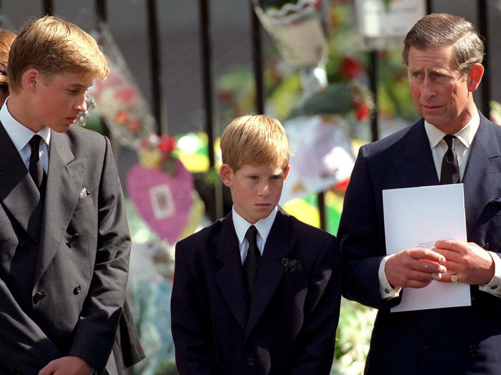 William and Harry with their father, Prince Charles. Picture: Anwar Hussein/WireImage