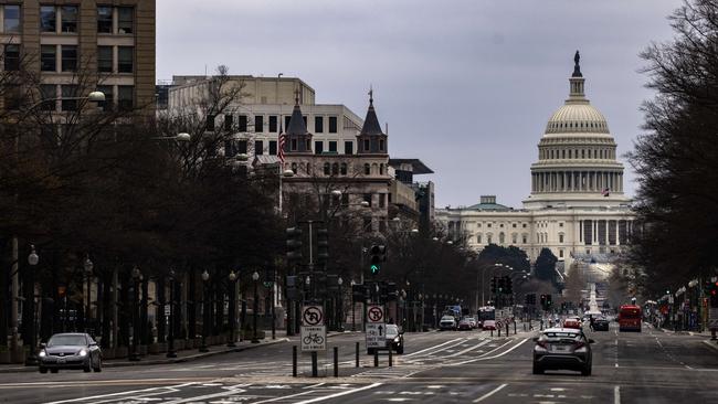 The US Capitol building is seen down Pennsylvania Avenue.