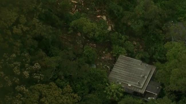 Wild wet and windy storm weather has triggered a landslide on Sydney's far north shore as the Australian eastern seaboard continues to get lashed by heavy rain and wind. Picture: 9News