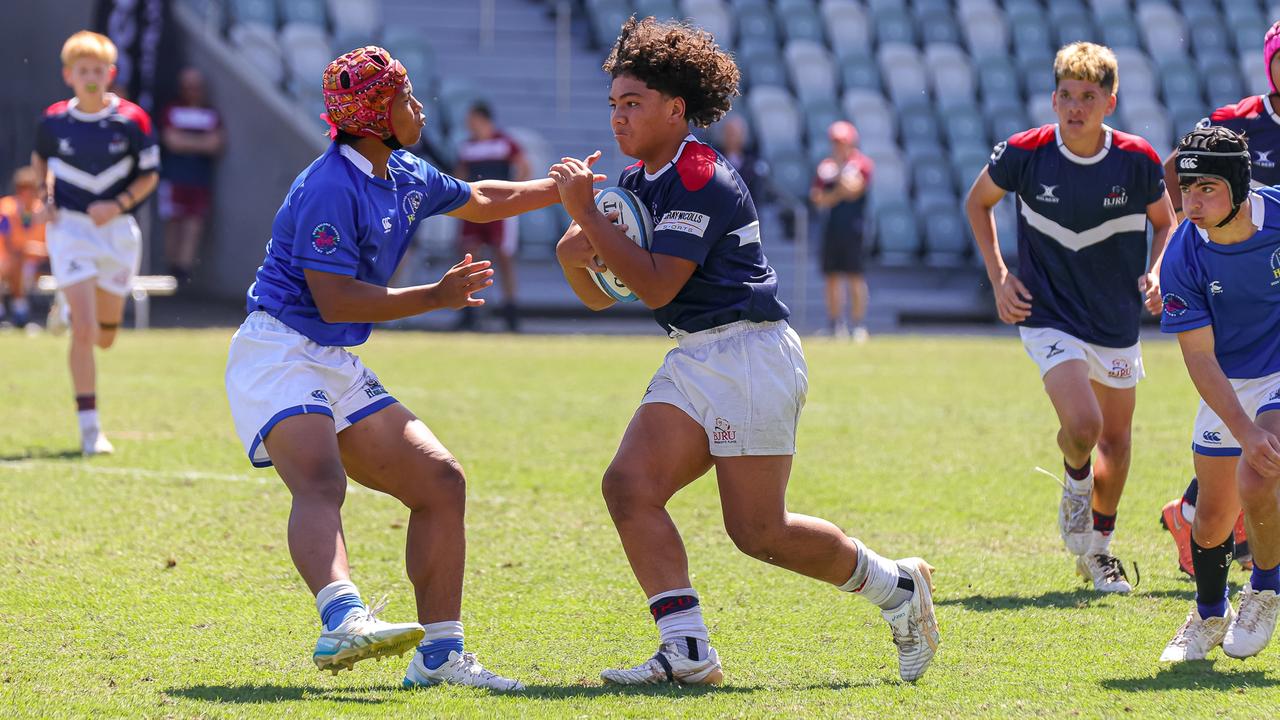 Buildcorp Emerging Reds Cup action from the day one match between Queensland Country Under-14s and Brisbane Junior Rugby Union Under-14s. Picture credit: QRU Media/ Erick Lucero.