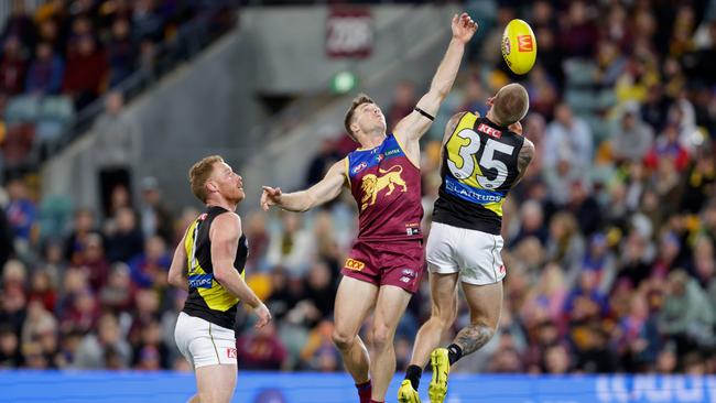 BRISBANE, AUSTRALIA – JUNE 29: Lincoln McCarthy of the Lions attempts to mark the ball during the 2023 AFL Round 16 match between the Brisbane Lions and the Richmond Tigers at The Gabba on June 29, 2023 in Brisbane, Australia. (Photo by Russell Freeman/AFL Photos via Getty Images)