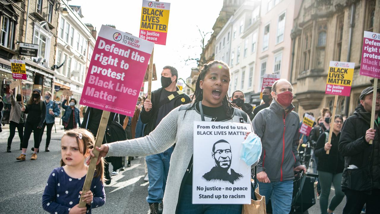 Protesters march to Oxford University’s Oriel College. Picture: Laurel Chor/Getty Images