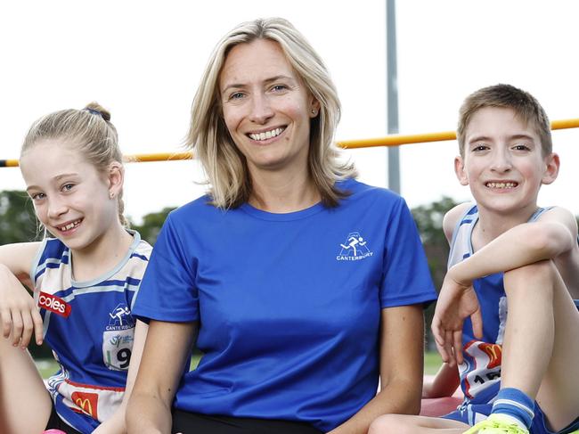 WEEKEND TELEGRAPH 14TH FEBRUARY 2025Pictured at Campbell Field in Canterbury are Canterbury Little Athletics member Riley Dickey, Club President Ljiljana Sentas and club members Harrison Davies and Fuad Ogle.The club got a federal grant for a high jump storage cage.Picture: Richard Dobson