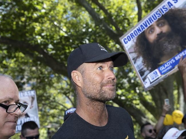 SYDNEY, AUSTRALIA - FEBRUARY 20: Pete Evans is seen at an anti-vaccination rally at Hyde Park on February 20, 2021 in Sydney, Australia. Evans is a controversial celebrity chef and conspiracy theorist who was recently banned fromÃÂ InstagramÃÂ and Facebook for sharing misinformation about the coronavirus and vaccines. The protestors are demonstrating against mandatory COVID-19 vaccines. The COVID-19 vaccine is due to be rolled out to frontline health workers across Australia from next week. The Australian government has purchased enough vaccines for all Australians to be vaccinated, should they choose to do so. While vaccinations are not mandatory, some industries might require workers to get the COVID-19 vaccine as a condition of employment. (Photo by Brook Mitchell/Getty Images)