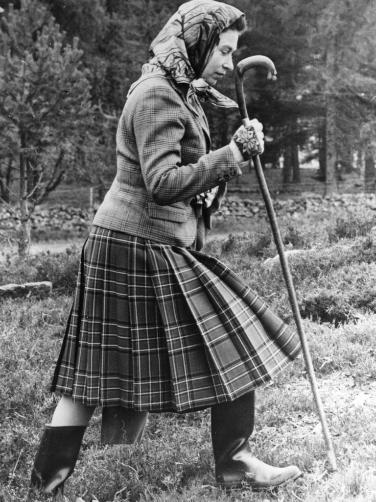 Queen Elizabeth II is a fan of plaid in October 1967.