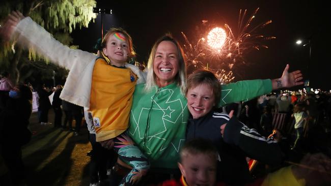 Olympic gold medallist Brooke Hanson celebrates with her children at Broadbeach as Brisbane is named as host of the 2032 Games. Picture Glenn Hampson