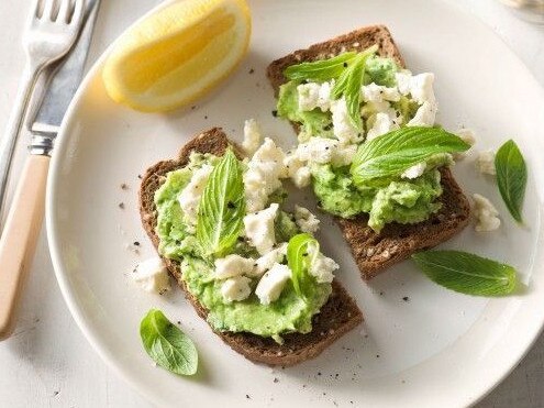 Avocado & feta smash on toasted rye.