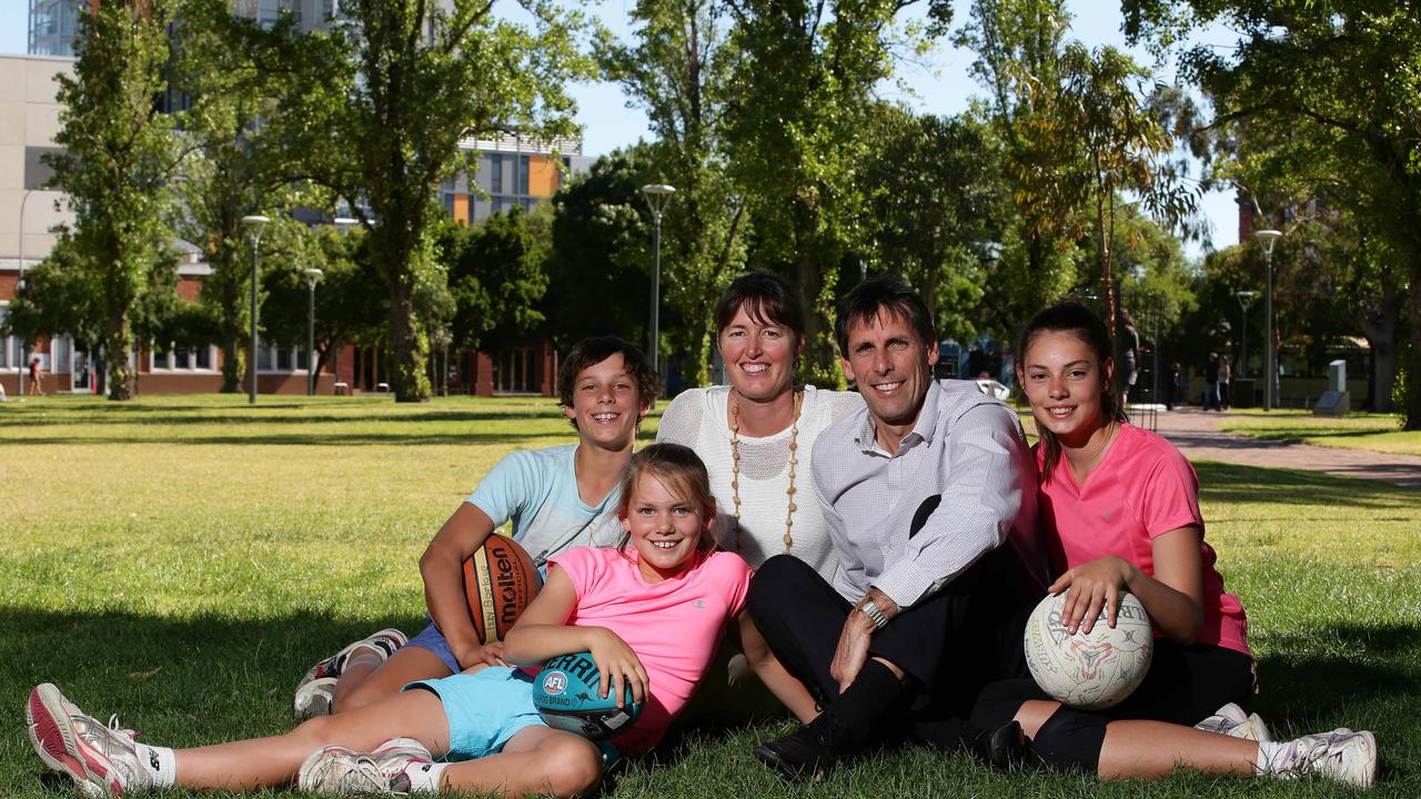 James (left) with his family, mum Jenny, dad Darryl and sisters Izzy and Ella, seven years ago.