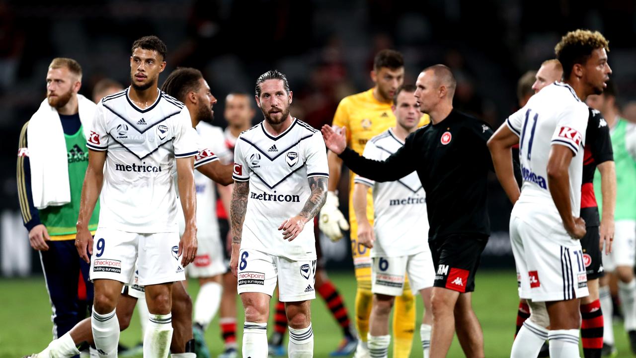 SYDNEY, AUSTRALIA - FEBRUARY 10: Victory players react at full time during the A-League match between the Western Sydney Wanderers and the Melbourne Victory at Bankwest Stadium, on February 10, 2021, in Sydney, Australia. (Photo by Brendon Thorne/Getty Images)