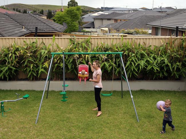 Leanne Kutle with Ivy and Lucas in their Harrington Park backyard. Picture: Sam Ruttyn